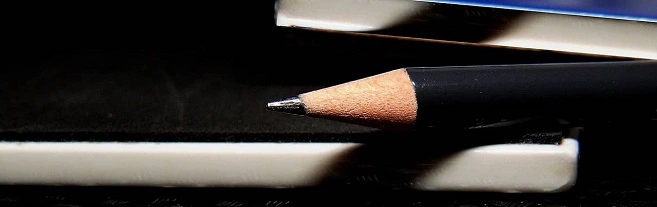 Crayon noir et son ombre